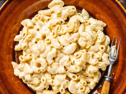 Macaroni en crema blanca y ricotta